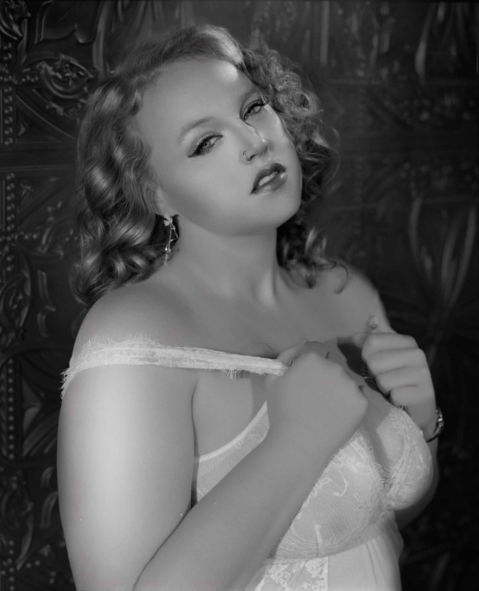 Boudoir portrait in classic Hollywood black and white made at the Charleston studio of Paolo Portraits