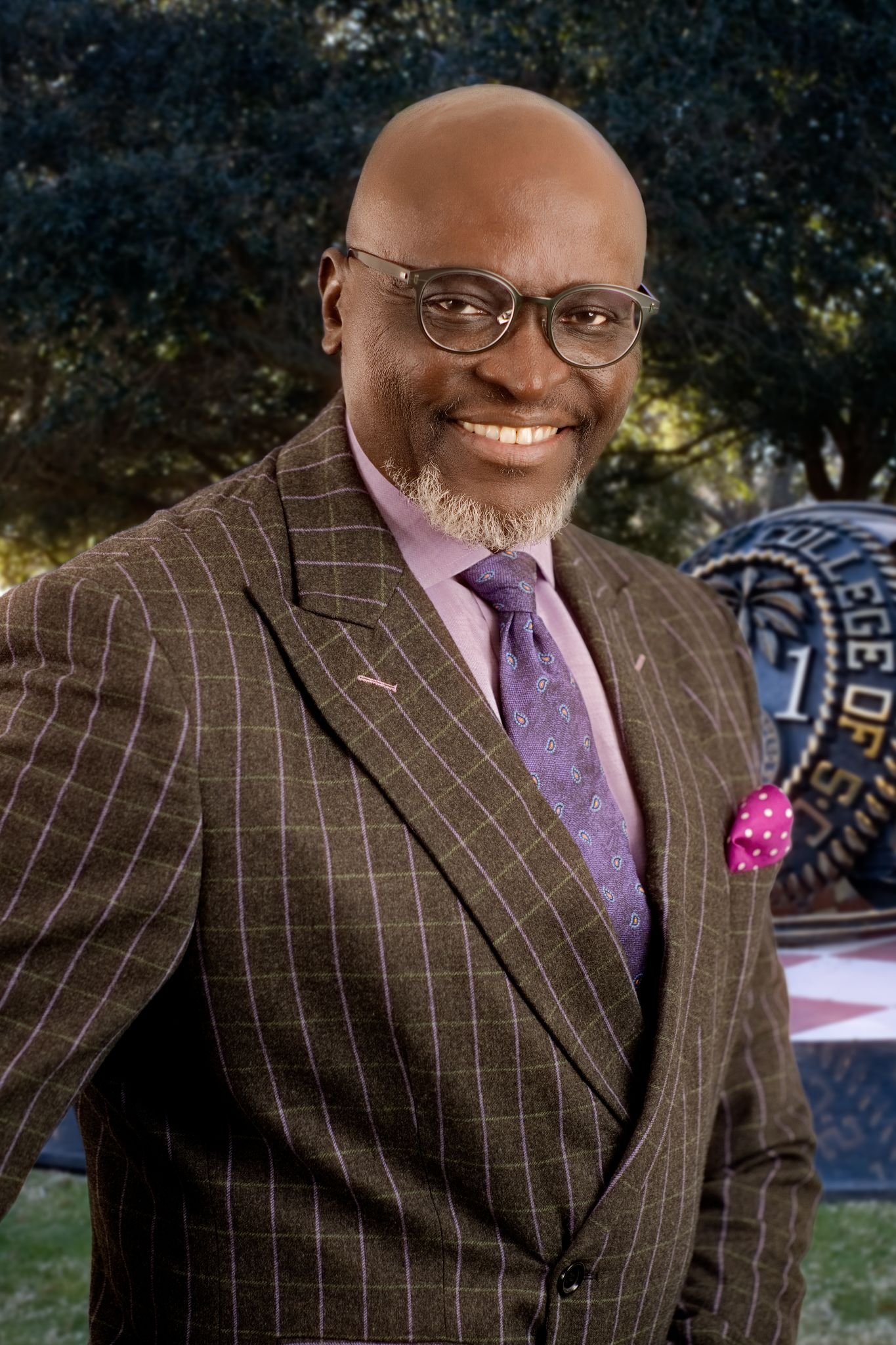Professional headshot of black male financial advisor, made by Paolo Portraits in Charleston SC