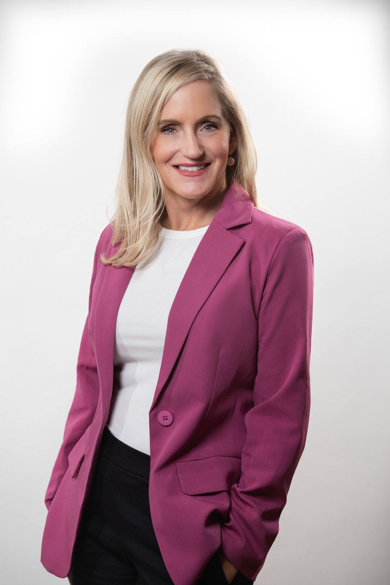 Professional headshot of female entrepreneur, made by Paolo Portraits in Charleston SC